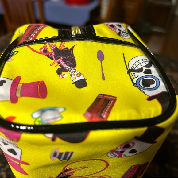 NWOT Betsey Johnson makeup travel bag in vibrant yellow with skull design. - Picture 7 of 10